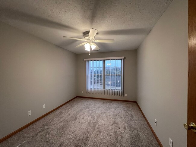 Building Photo - End Unit Two Bed Two Bath Second Floor Con...