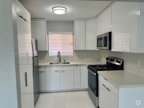 Building Photo - 7965 W 30th Ct