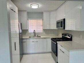 Building Photo - 7965 W 30th Ct