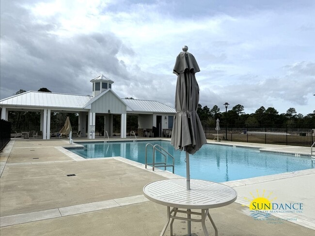 Building Photo - Stunning Solar-Powered 4-Bedroom Oasis in ...
