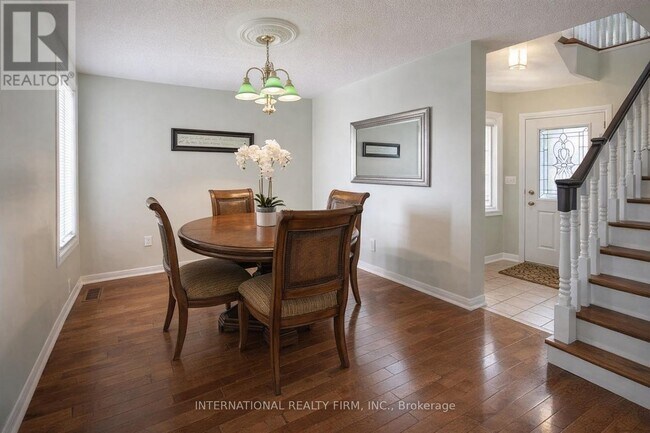 Photo du bâtiment - 3259 High Springs Crescent