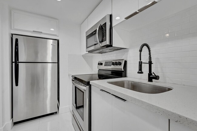 Building Photo - Fully Renovated Two Story Loft in Coral Ga...