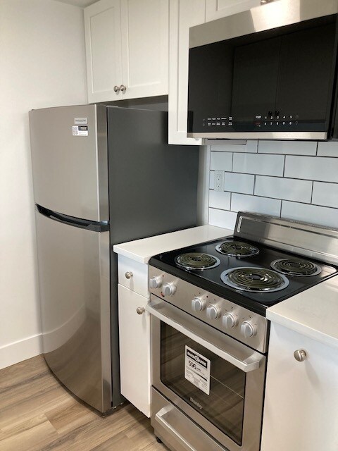 Photo du bâtiment - Bright 1 Bedroom with Outdoor Space
