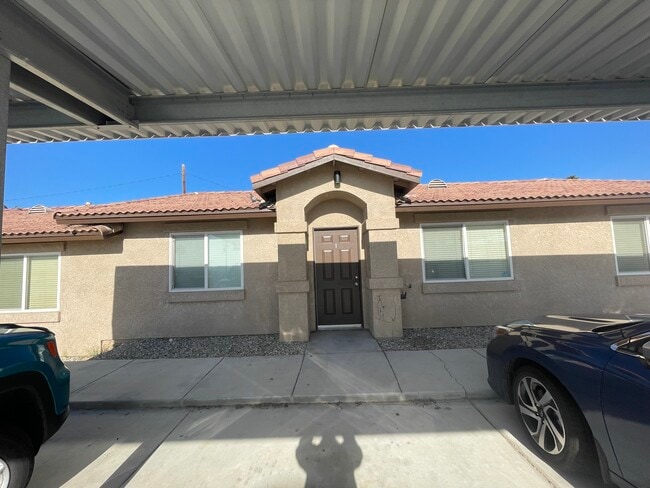 Front entry and covered parking - 73641 Sunnyslope Dr