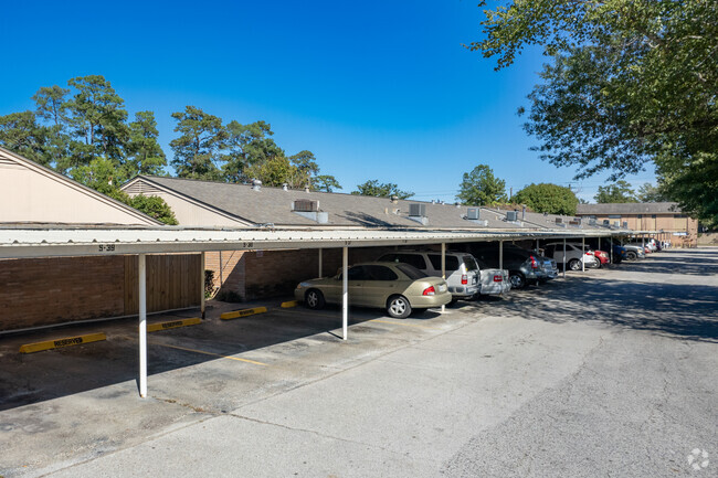 Covered parking - Villagewood Townhomes