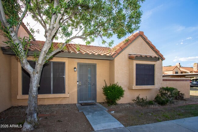 Building Photo - 5704 E Aire Libre Ave