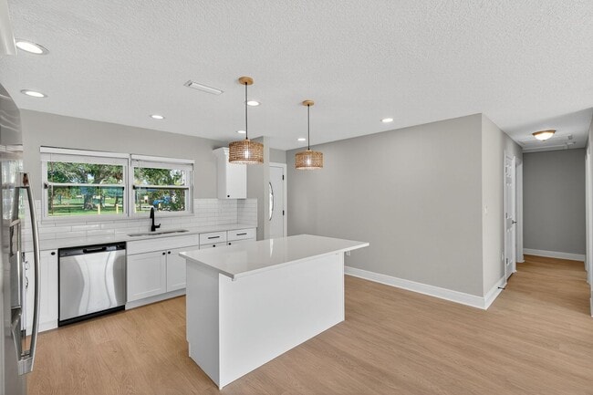 Building Photo - Fully Remodeled 3BR Home with Large Fenced Yard & New Deck