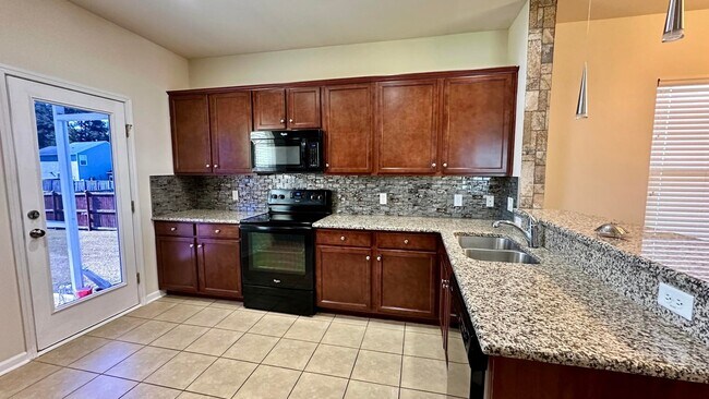 Foto del edificio - 9706 Tackle St