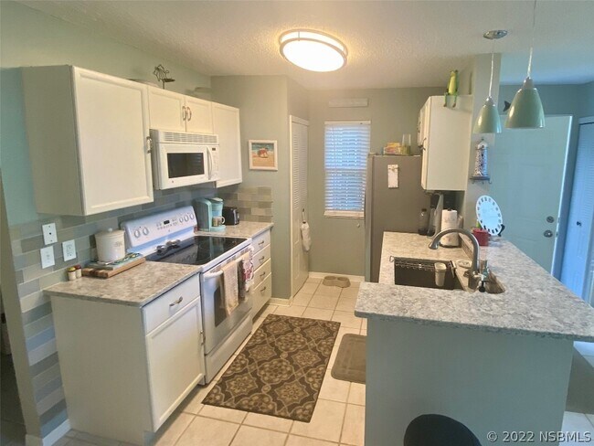Building Photo - 4208 Sun Village Ct