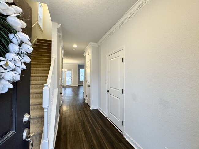 Building Photo - A 1st-Time Rental Available NOW! 3/3.5 Newer End-Unit Townhome w/Garage - Landscaping Included!
