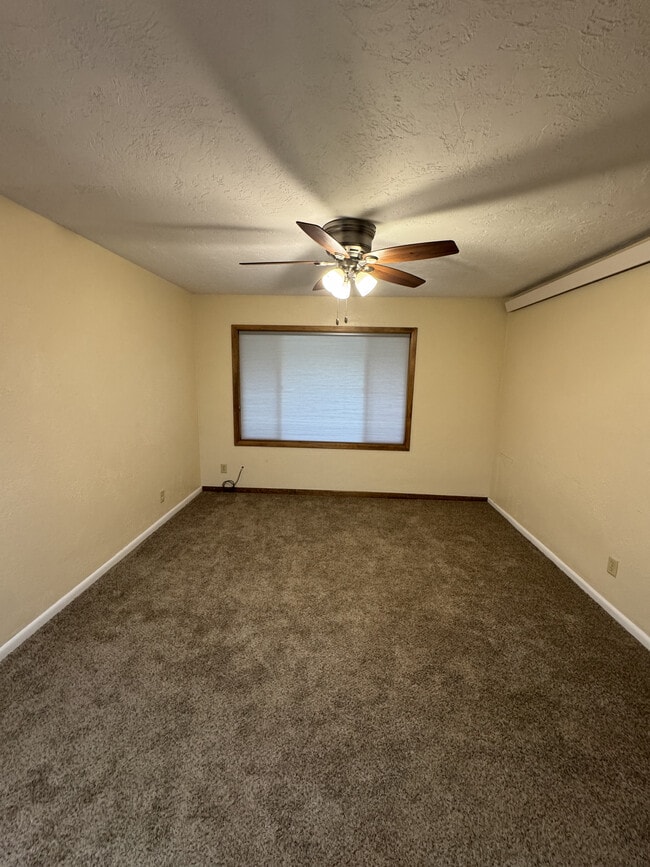 Sala de estar - The Cooper Apartment Homes
