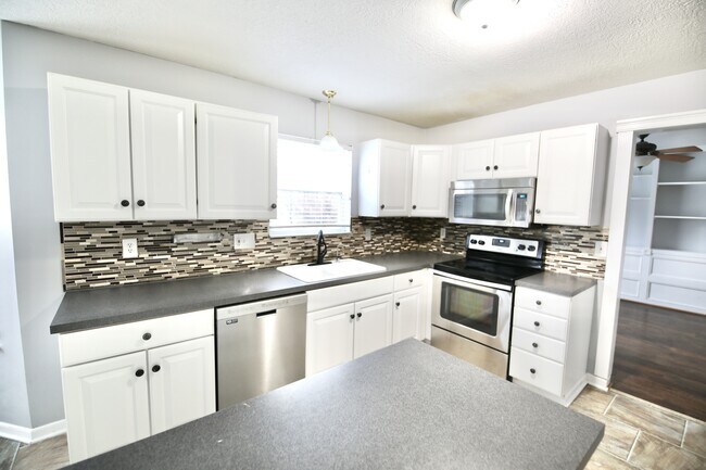 Foto del edificio - 4400 Greensbury Dr