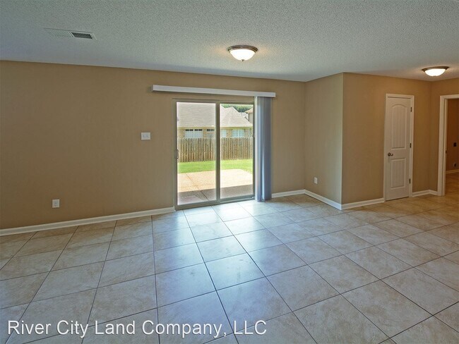 Building Photo - 3 br, 2.5 bath House - 4571 Tulip Creek Dr