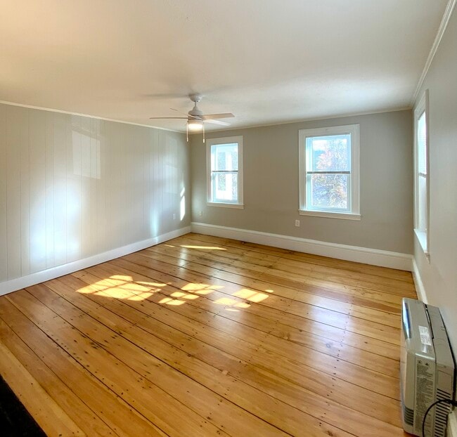 Newly refinished wide plank wood floors - 5 Chapel St