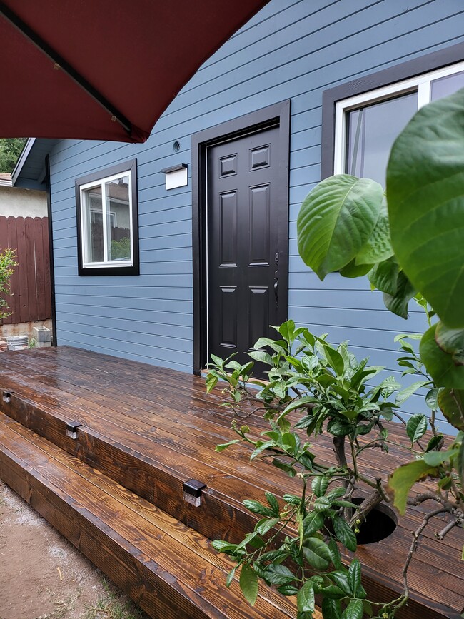 Wood deck with inserted Pomelo & Pomegranite trees - 2327 Las Colinas Ave