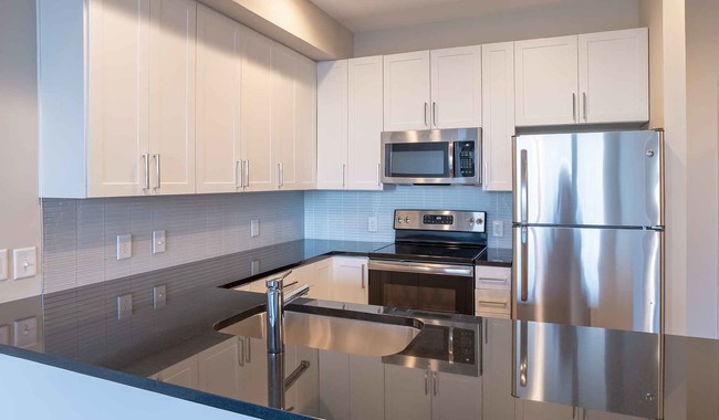 Your spacious kitchen has ample cabinet storage - One Ardmore