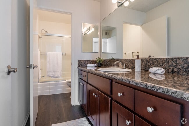 3BR, 2BA - Deauville - 1,300SF - Bathroom - Versailles on the Lake Apartments