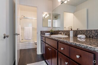 3BR, 2BA - Deauville - 1,300SF - Bathroom - Versailles on the Lake Apartments