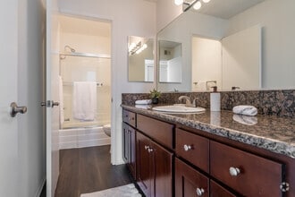 3BR, 2BA - Deauville - 1,300SF - Bathroom - Versailles on the Lake Apartments