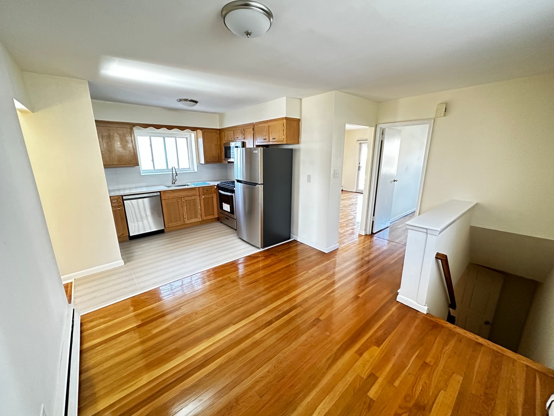 Newly renovated kitchen and dining space - 2892 Coddington Ave