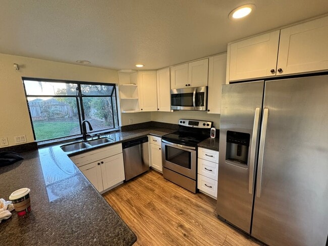 Building Photo - Elegant 4-Bed, 3-Bath Two-Story Home with Spacious Backyard and Private Downstairs Suite