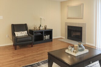 Living Room w/Fireplace - The Crest at Princeton Meadows