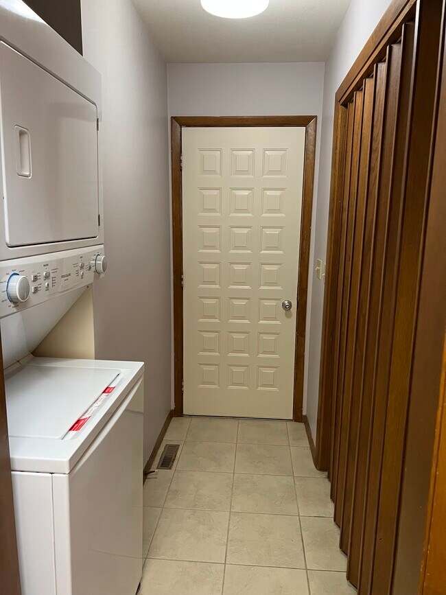washer and dryer on the left side - 2508 Dogwood Dr