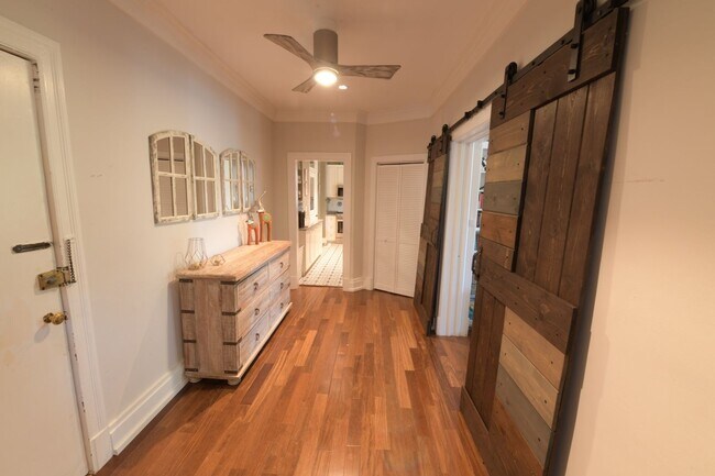 Building Photo - Charming 2BR + home office Condo in the he...