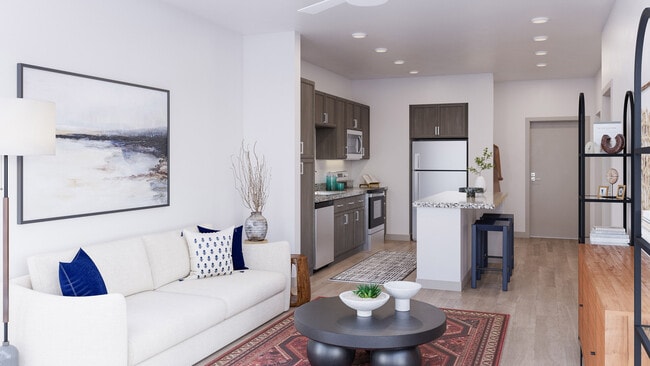 Moderno apartamento de concepto abierto con sala de estar, isla de cocina, acabados neutros y muebles contemporáneos para la comodidad diaria. - Mesquite Trails at Brooks