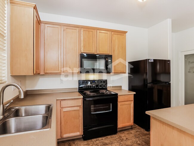 Foto del edificio - 10010 W Winslow Ave