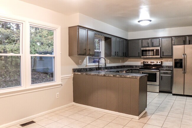 Building Photo - 10301 Tingewood Ter