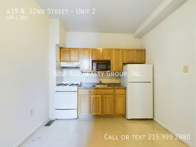 Foto del edificio - Spacious, Bi-level Apartment Available at ...