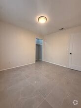 Building Photo - 7210 Manhattan Dr