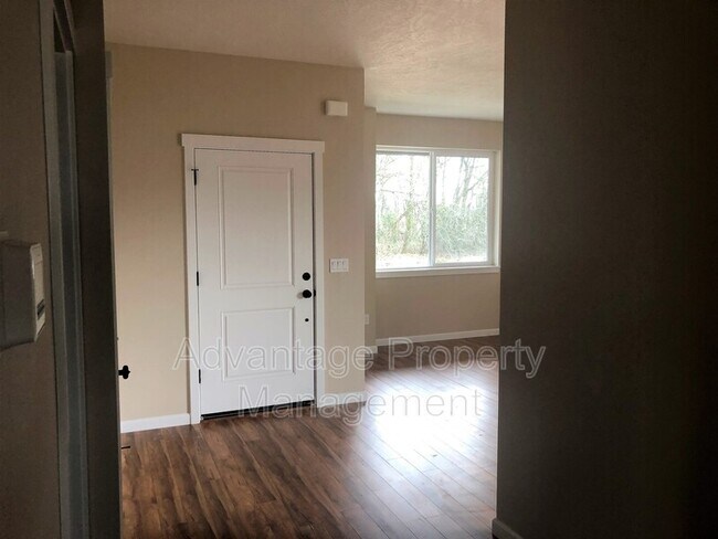 Building Photo - 5836 NE Chandra Ct