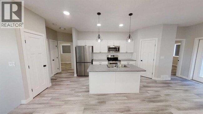 Photo du bâtiment - 10526-10131 131 Ave