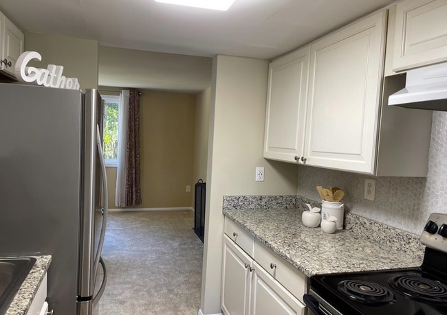 Kitchen into living area - 6510 Overheart Ln