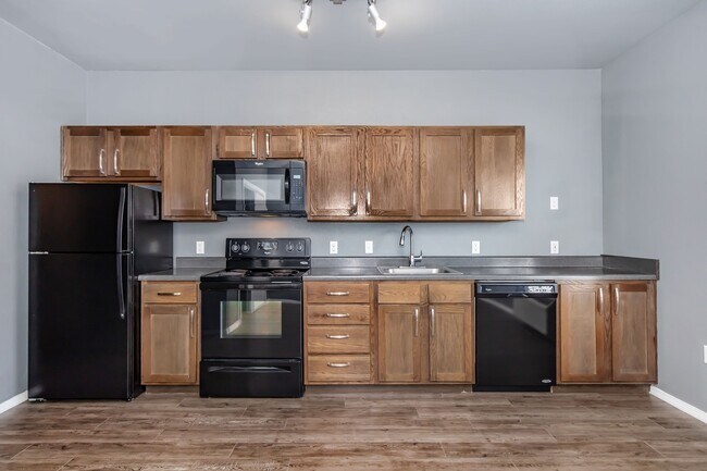Cocina Falcon Studio de 395 pies cuadrados - The Falcon of Southern Hills Apartments