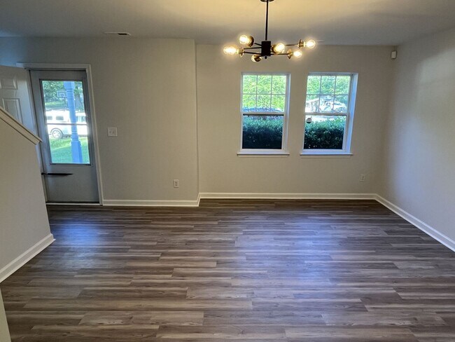 Building Photo - Refreshed 3 Bedroom End Unit Townhome near...