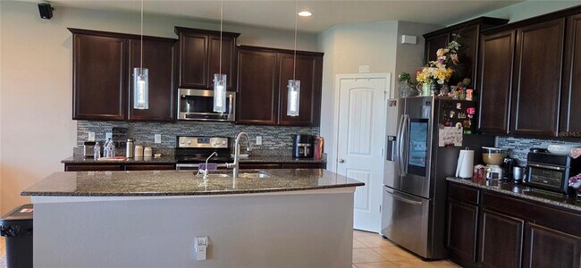Foto del edificio - 9215 Mountain Magnolia Dr