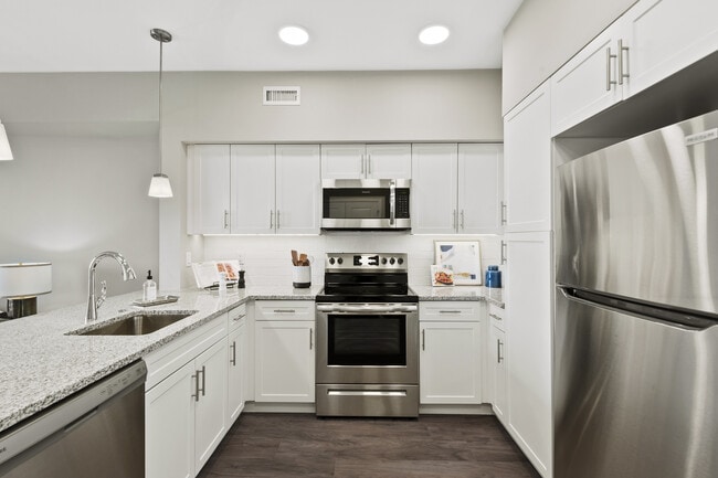 Building Photo - Avenida at Centerra 55+ Active Adult Apartment Homes