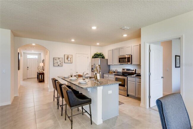 Building Photo - Riviera Bella - River Community Welcome to your new home!