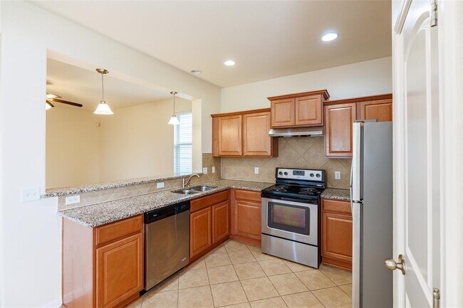 Foto del edificio - 5413 Falling Leaf Ln