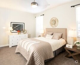 Comfortable Bedroom - Parc on Center Apartments & Townhomes