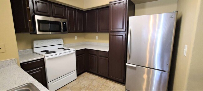Building Photo - New Carpet and Appliances