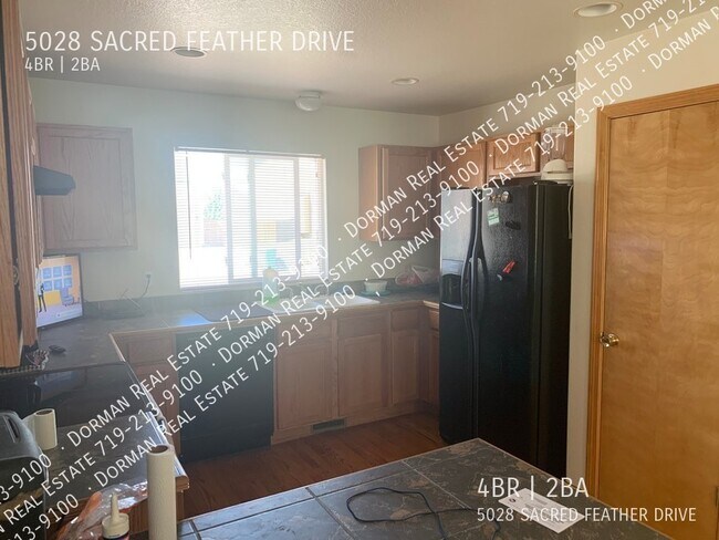 Foto del edificio - 5028 Sacred Feather Dr