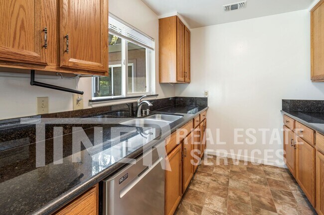 Building Photo - Updated Home with Sprawling Yard  in Centr...