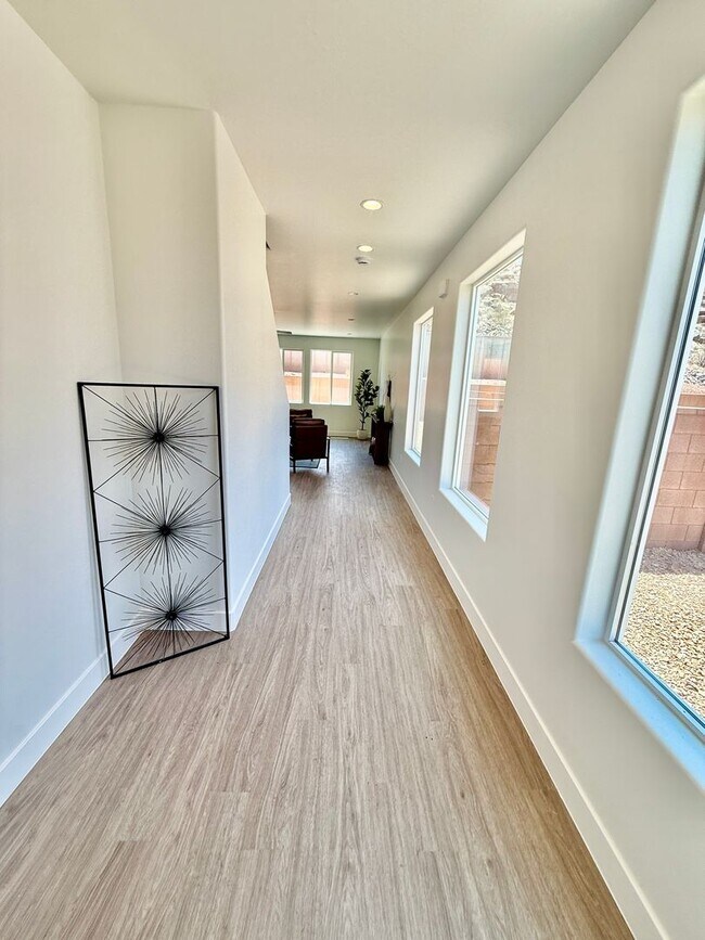 Building Photo - BRAND NEW Four Bedroom Townhome in Desert ...