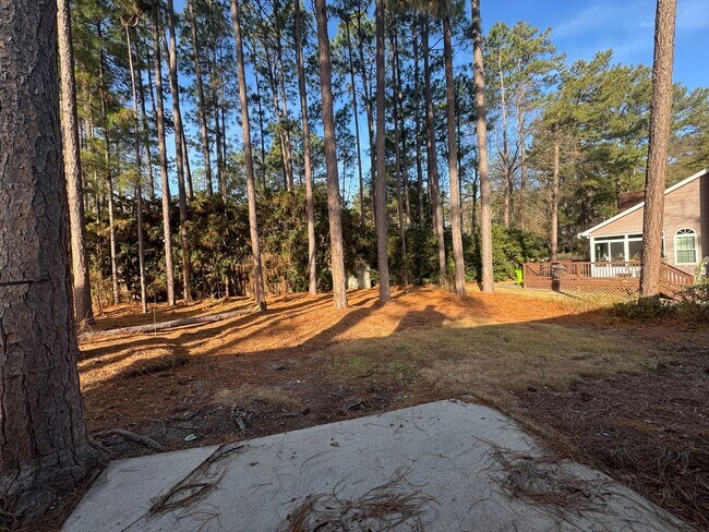 Foto del edificio - Charming 3BR/2BA Home with Garage, Covered Porch & Patio Near Harbison