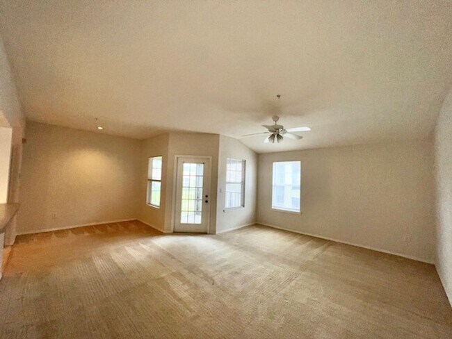 Building Photo - Move in NOW- Spacious 2 bedroom 1 bath condo on 3rd floor in gated community! Water included with...