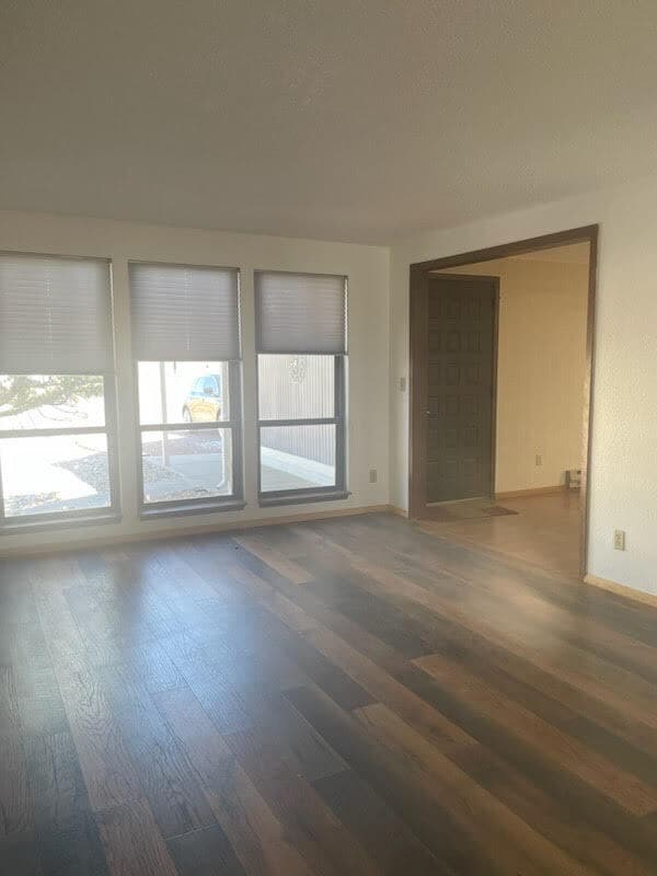 Spacious living room is just off the main entrance with a view of the front porch. - 240 W Kyle Dr